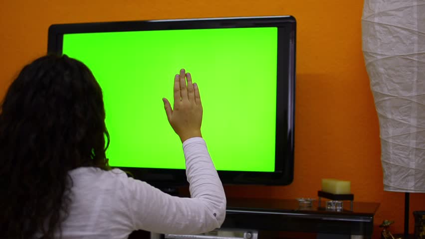 smart TV touchscreen gestures dolly shoot, 1080. Beautiful teen girl makes