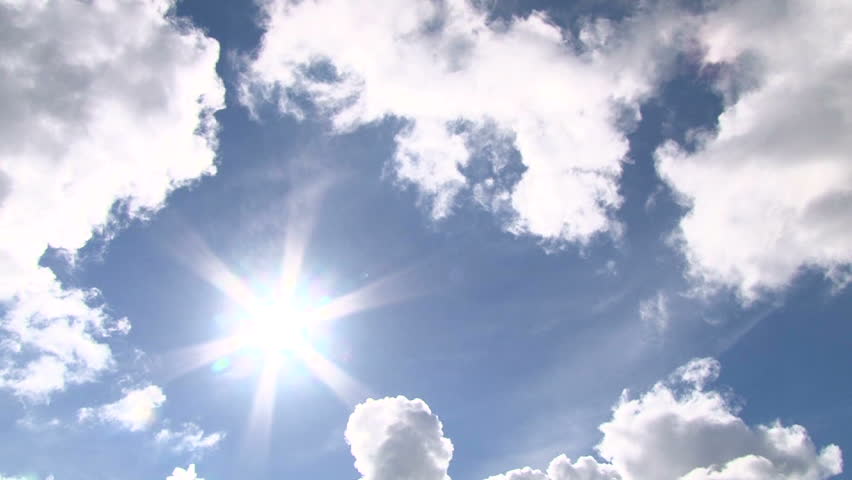 One hour time lapse of cloudscape with bright sun shining behind dark storm clouds. Royalty-Free Stock Footage #4751231