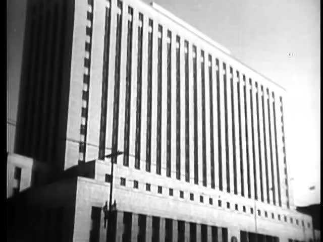 Establishing shot of post office and court house