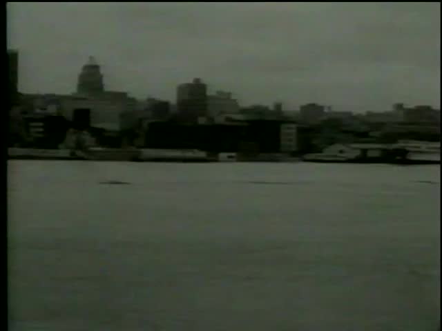 Heavy flood from the rising water of Ohio river in Cincinnati, OH circa March, 1964-MGM PICTURES, UNIVERSAL-INTERNATIONAL NEWSREEL, USA, filmed in 1964