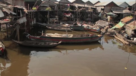 Cambodia - Boats and houses on the flooded river - Mekong River