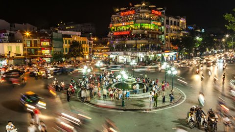 HANOI - SEPTEMBER 18: Timelapse view of crazy traffic in Hanoi Hoan Kiem district (old quarter) on September 18 2013 in Hanoi, Vietnam. 