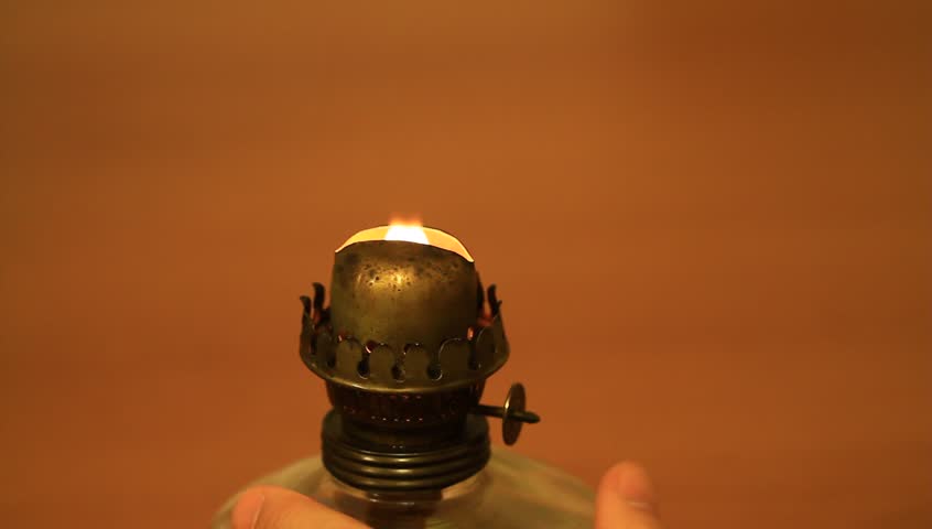 Oil lamp calibration. Preparing an old fashioned lantern. 