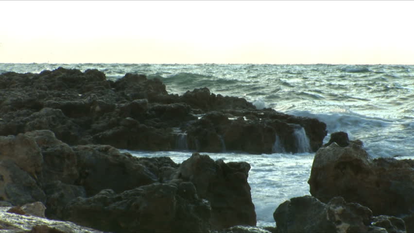 Waves fight about rocks in Black Sea for a background
