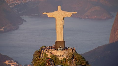 Aerial view of Christ the Redemeer Statue and Sugarloaf Mountain at Sunset, Rio de Janeiro, Brazil