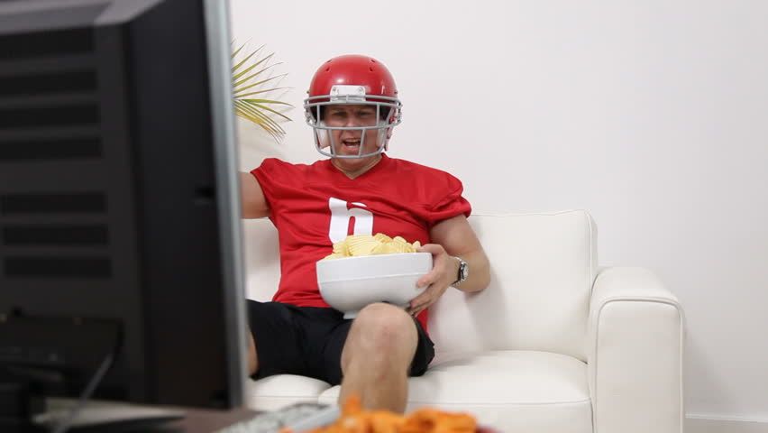 Man cheering on football