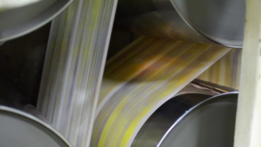 Newspaper printing - Stock Video. Newspaper coming fast of the printing machine