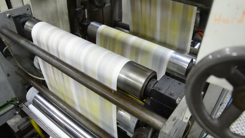 News print factory - Stock Video. Newspapers being carried to folding and