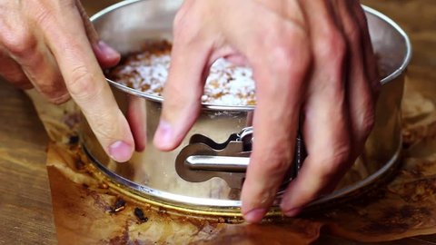 Apple Pie - Freshly Baked. Baker opening springform pan.  Stock Video