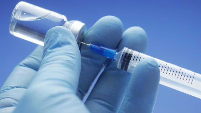 Filling syringe from vial