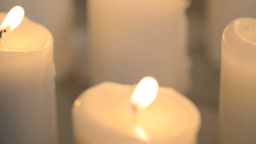 Closeup Shot Of A Single White Candle Burning With Soft Candle Light. Candle Wax
