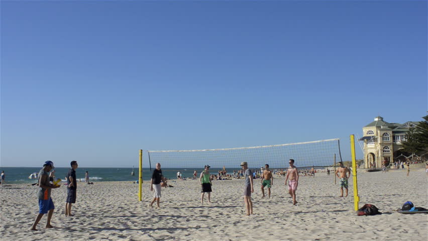 Perth, Western Australia - January 5 2013: A group of men playing beach