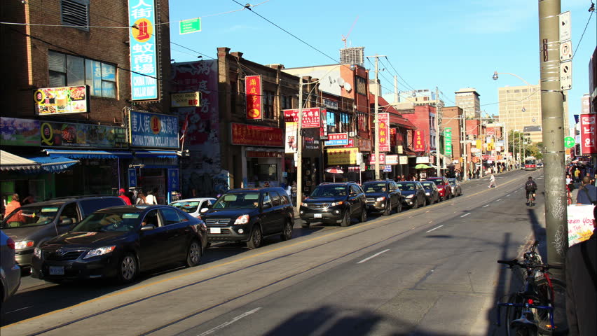 TORONTO, CANADA - SEP 25 2013: Chinatown along Toronto's Dundas Avenue, shot in