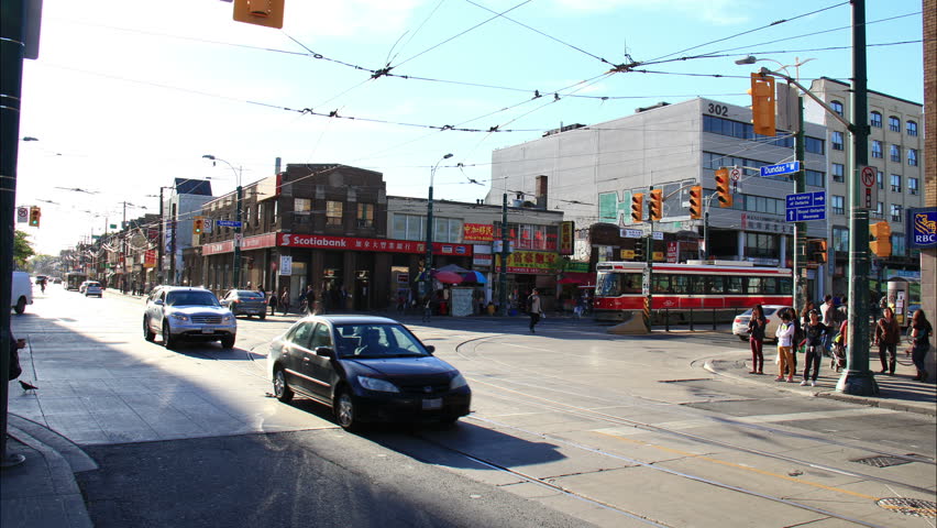 TORONTO, CANADA - SEP 25 2013: Chinatown at the intersection of Spadina and