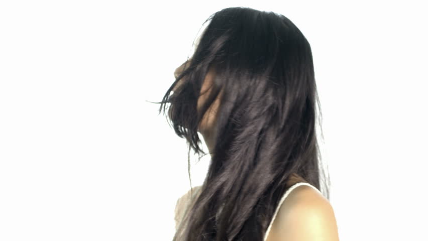 CU Young woman smiling against white background