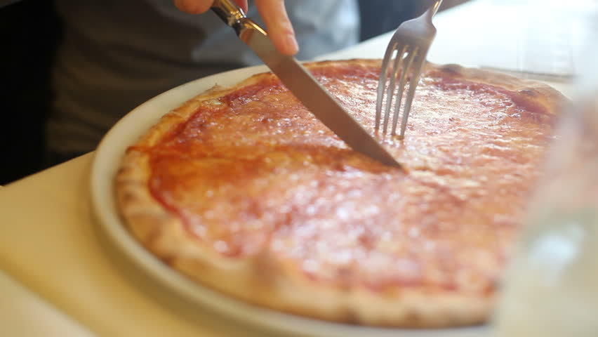 Slicing pizza