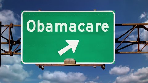 An Obamacare concept road sign.
