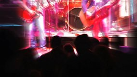 Fans silhouetted by the bright stage at rock concert - Powered by Shutterstock - Get 15% off with code: PIKWIZARD15