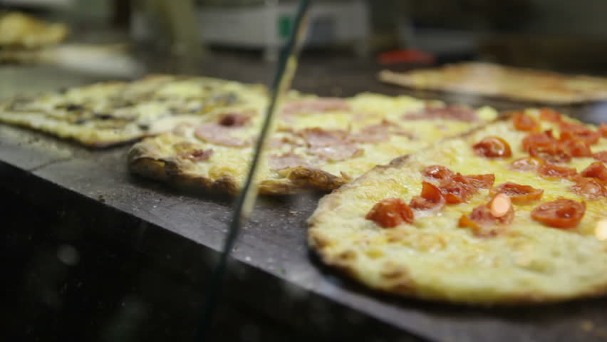 Pizza slice in italian restaurant