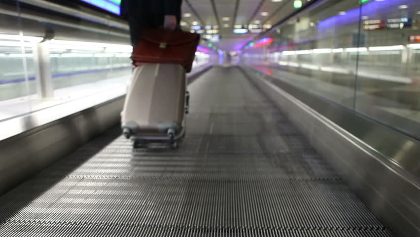 Airport walk way with passenger