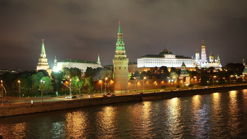 Moscow Kremlin and ships on river at night - hyperlapse