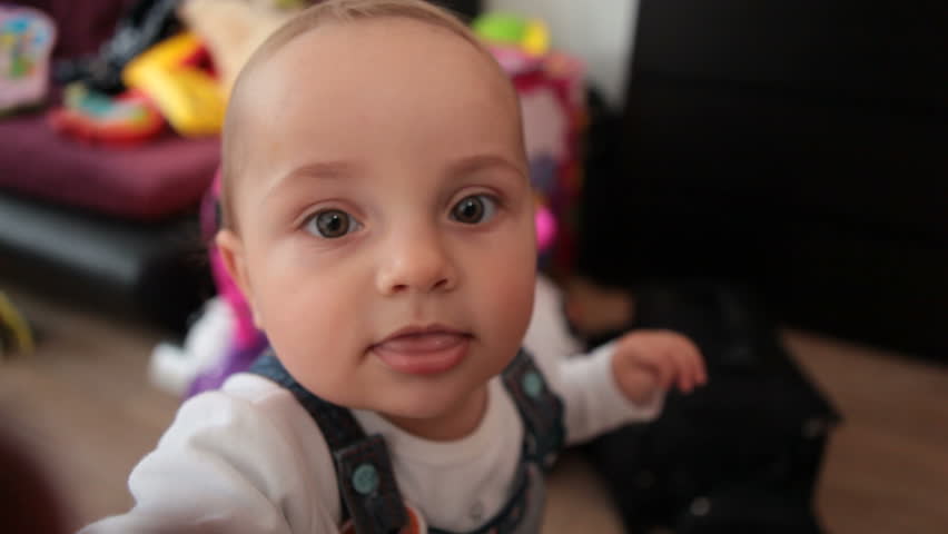 Baby touches camera