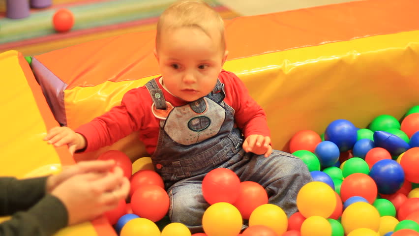 Baby in ball pool