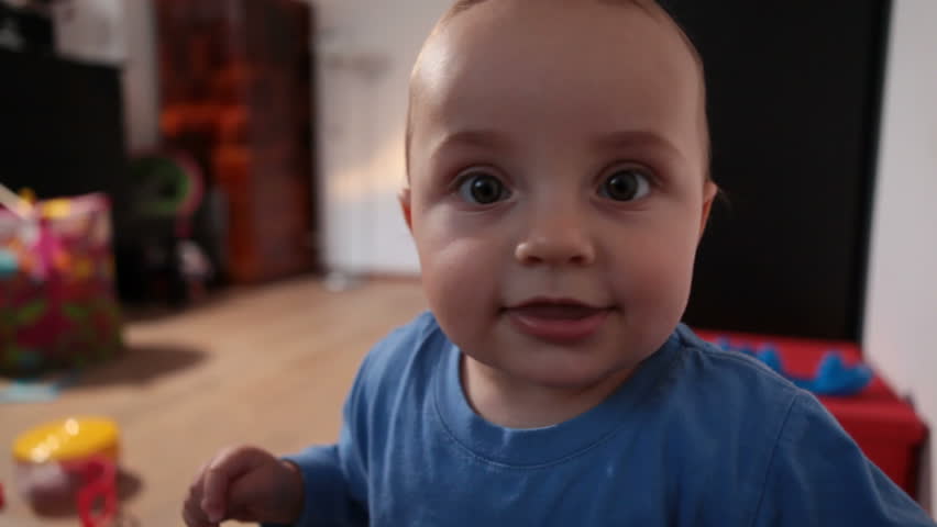 Baby touching camera