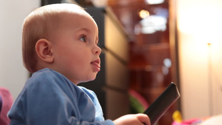 Baby with TV remote 2