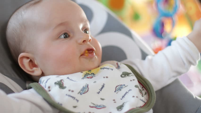 Baby eats baby food