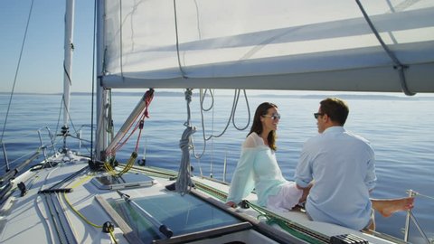 Couple relaxing together on Sail Boat, Seattle, WA 库存视频