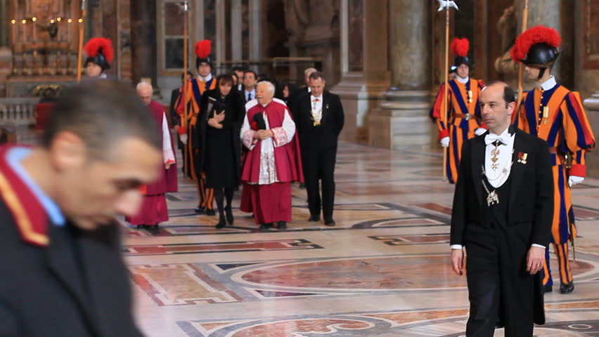 Rome, Vatican city - February 15th, 2012 - Priests and swiss guard in Basilica