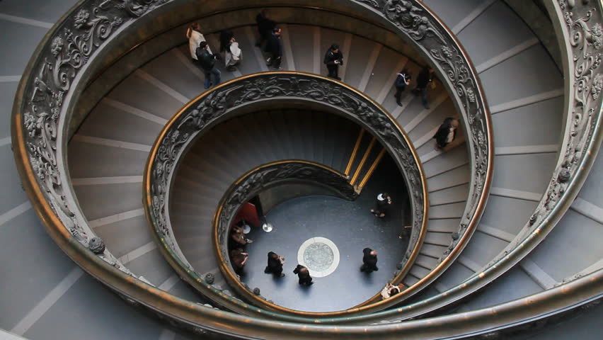 Rome, Vatican city - February 15th, 2012: People walking down spiral stairs in