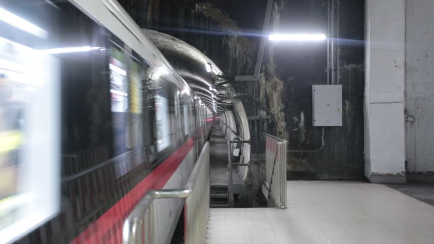 Metro train arriving and departing in underground station on Sep 29, 2013, in