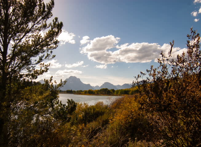 PAL - Time lapse clouds travel over Oxbow Bend, Yellowstone National Park, Wyoming.