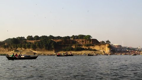 Pan shot boats in a river during Kumbh Mela, Ganges River, Allahabad, Uttar Pradesh, India