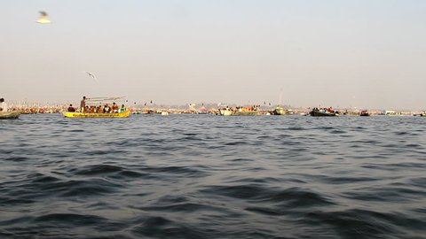 Pan shot boats in a river during Kumbh Mela, Ganges River, Allahabad, Uttar Pradesh, India