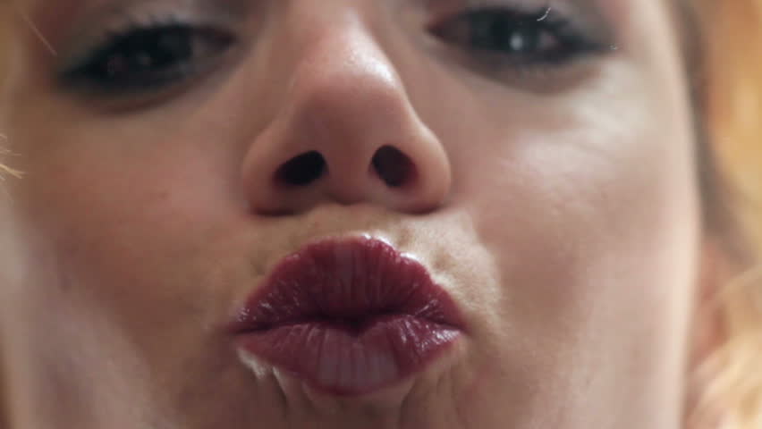 Получите стоковое видео «Woman Giving Kiss Leaving Mark On» продолжительнос...