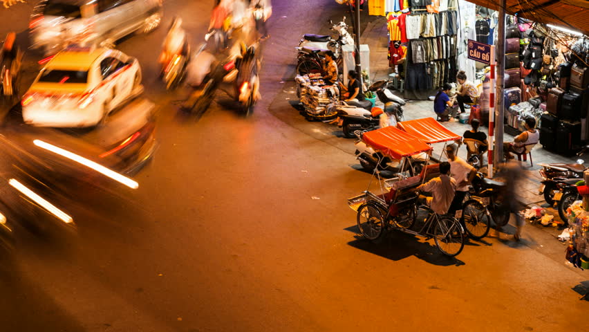 HANOI - SEPTEMBER 17: Timelapse view of cyclo taxi in Hanoi Hoan Kiem district