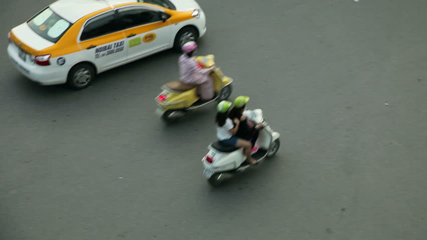 HANOI - SEPTEMBER 17: Tracking view of crazy traffic in Hanoi Hoan Kiem district