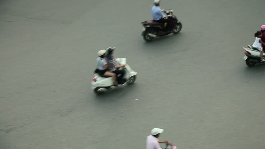 HANOI - SEPTEMBER 17: Tracking view of crazy traffic in Hanoi Hoan Kiem district