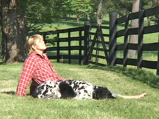 Girl with dog outside