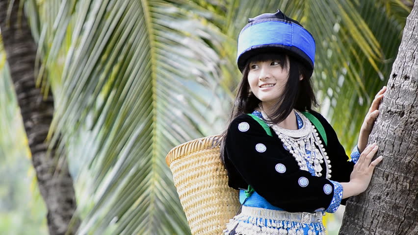 cute asian young girl in beautiful hill tribe (HMONG) costume of northern