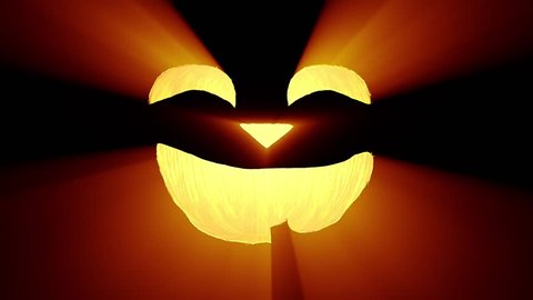 Shining Jack-O-Lantern. Halloween pumpkin with smiling face isolated on the black background. Seamless loop. More color options available - check my portfolio.