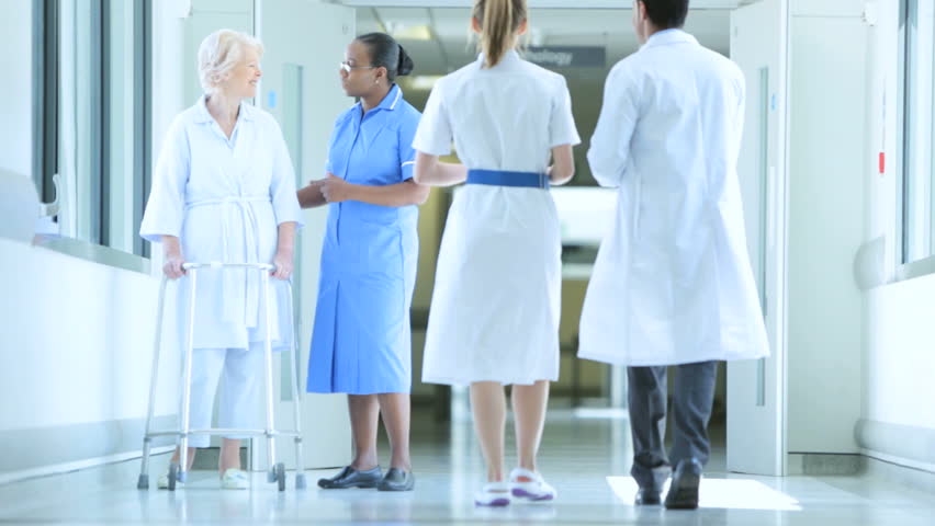 elderly patient walking down hospital corridor Stock Footage Video (100 ...