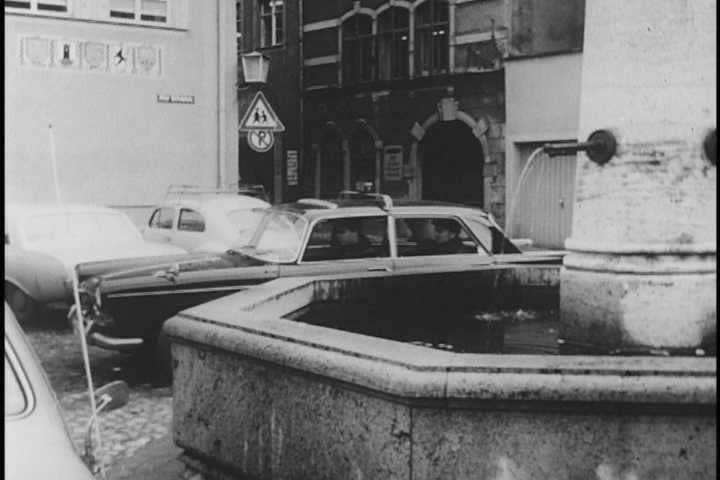 1960s - Communist spies meet on a street in Europe in 1964. Others are seduced with sex and alcohol.