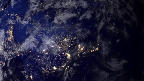 Telecommunication satellite over Asia, night view from space.. Cinema quality 3D animation. HD. The focus changes from earth to satelite and back through the clouds. 