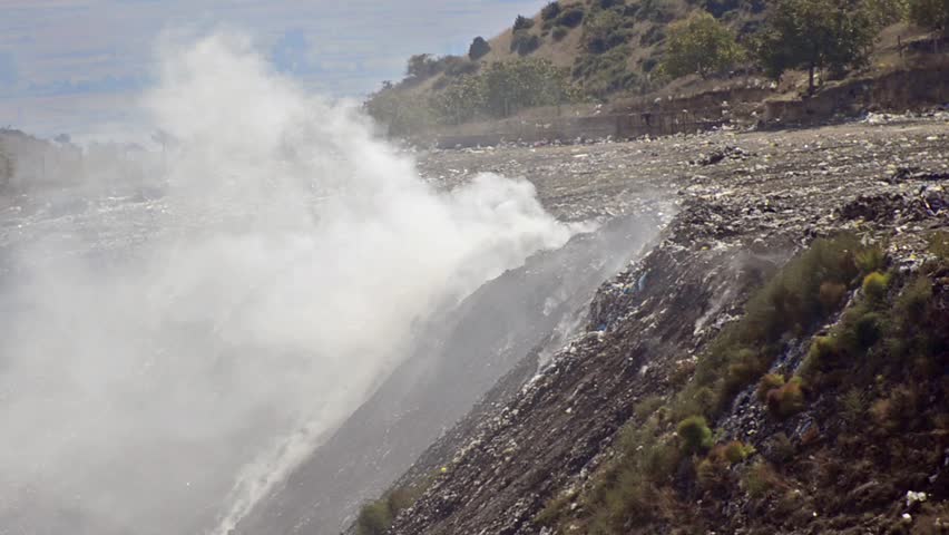Landfill - Stock Video. Smoke nature ecology disaster from burning garbage fire