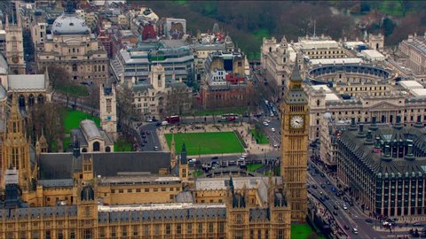 Panoramic aerial view of The Houses of Parliament (Palace of Westminster) in Central London, UK. Features Big Ben, The Treasury Building and the River Thames.