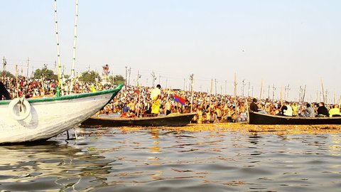 Allahabad, Uttar Pradesh, India - 02/09/2013 - Pan shot boats in a river during Kumbh Mela, Ganges River, Allahabad, Uttar Pradesh, India